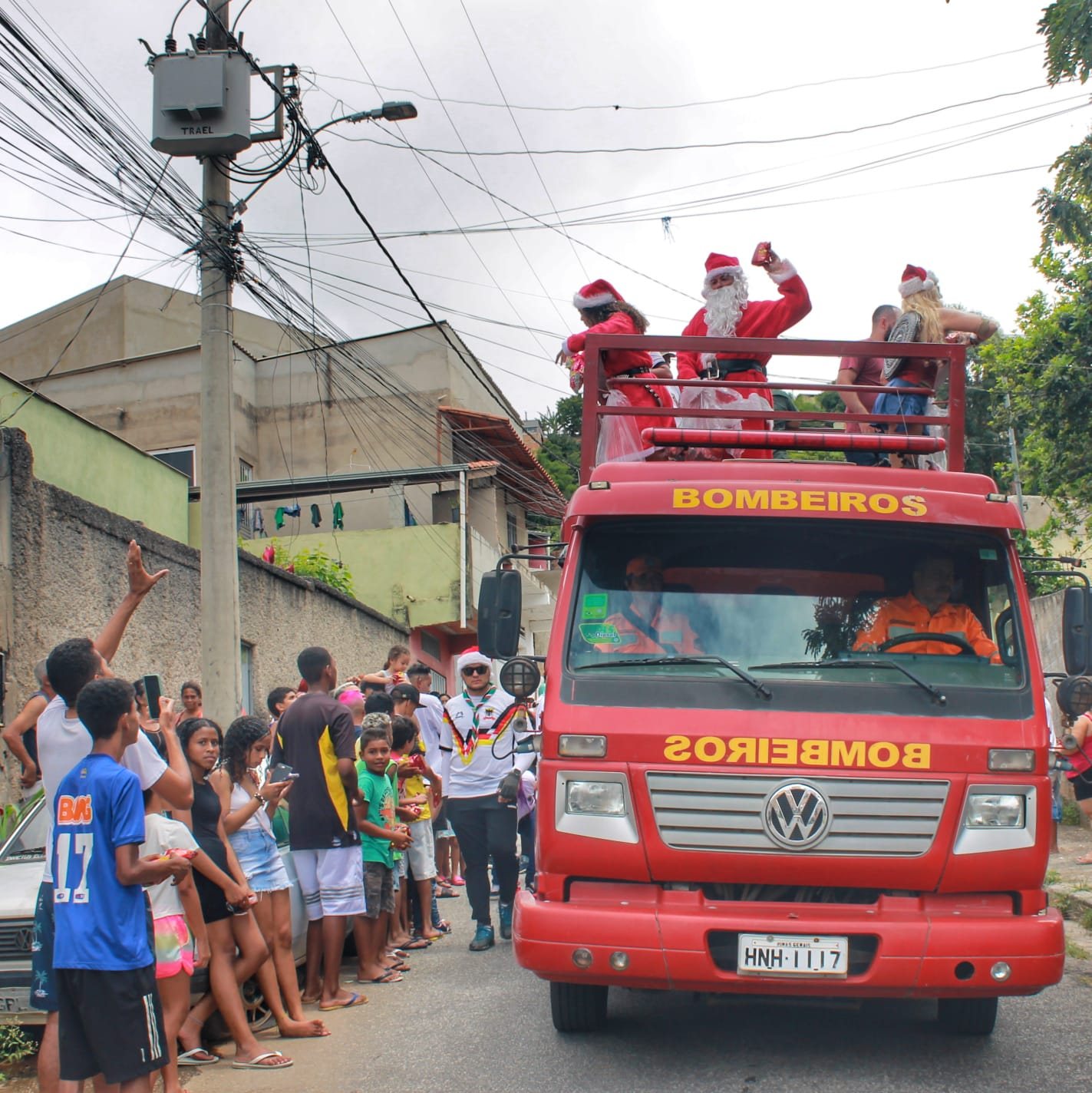 Santa waving from the top of the fire truck, Christmas 2022