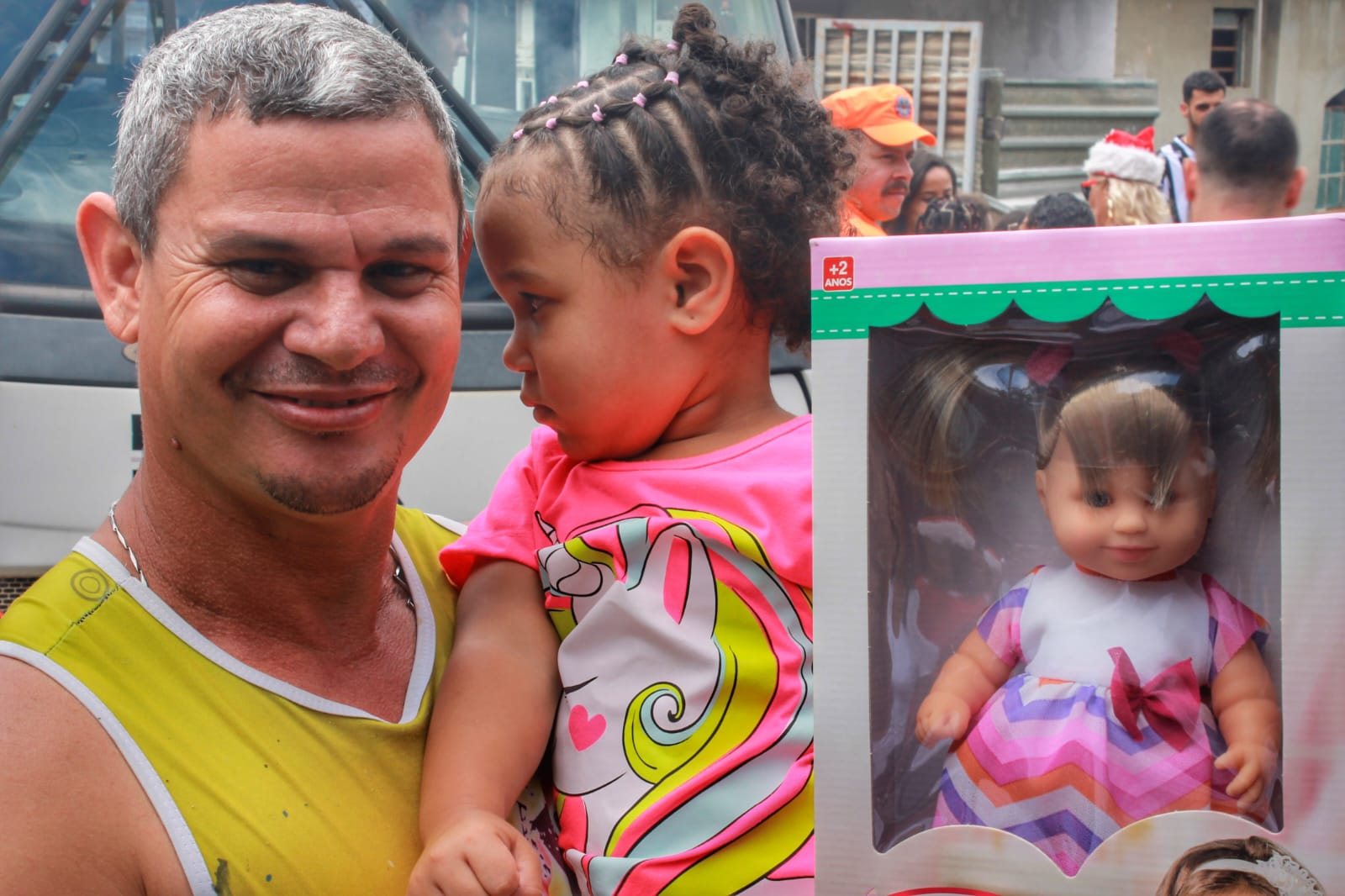 A dad and his daughter with her new doll, 2022