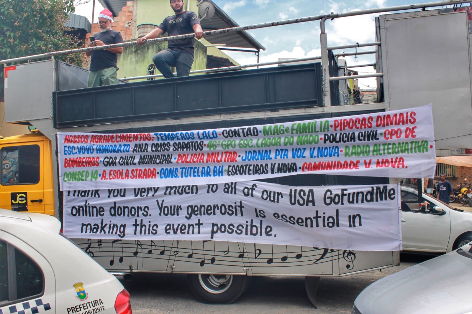 Truck banner thanking USA GoFundMe donors, 2022
