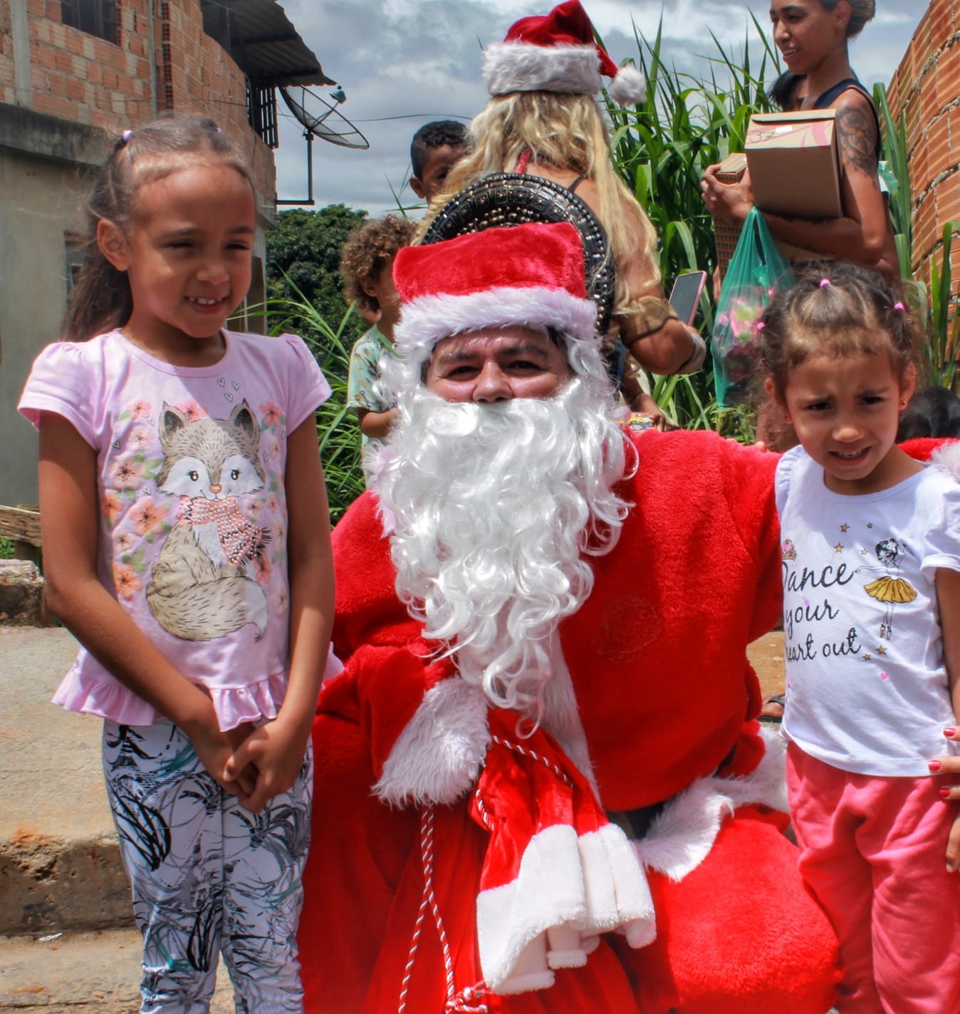 Santa visiting two girls, Christmas 2022